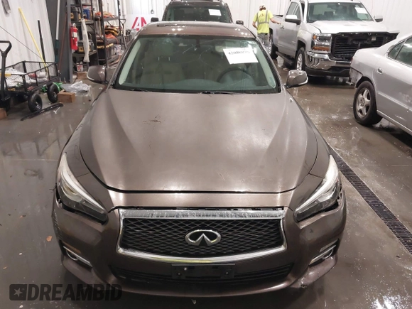 2015 Infiniti Q50 Premium z VIN JN1BV7ARXFM418280, wystawiony jako IAAI lot #42080879 z przebiegiem 126 411 mil mil oraz . Historia ofert i sprzedaży dostępna na DreamBid. Obrazek 12.