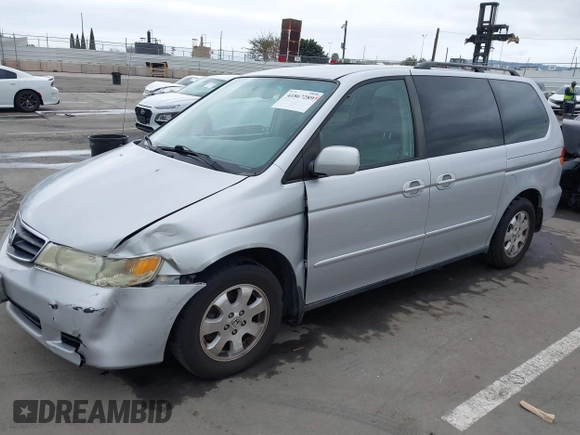 2003 Honda Odyssey EX-L with VIN 5FNRL18943B030373, listed as a IAAI auction lot 41867289 with 179,718 mi miles and . Bid and sale history available at DreamBid. Image 2.