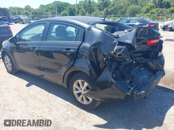 2013 Kia Rio EX with VIN KNADN4A32D6119638, listed as a IAAI auction lot 42313287 with 133,459 mi miles and . Bid and sale history available at DreamBid. Image 3.