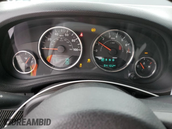 2014 Jeep Wrangler Sport with VIN 1C4AJWAG5EL326480, listed as a Copart auction lot 60653955 with 94,102 mi miles and Salvage title. Bid and sale history available at DreamBid. Image 9.