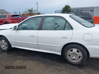 2001 Honda Accord EX z VIN 1HGCG16551A053095, wystawiony jako IAAI lot #41892751 z przebiegiem Nie podano mil oraz . Historia ofert i sprzedaży dostępna na DreamBid. Obrazek 14.