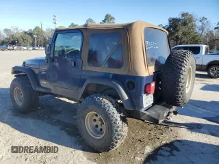 2000 Jeep Wrangler Sport with VIN 1J4FA49S7YP802304, listed as a Copart auction lot 47854795 with 0 mi miles and Salvage Title. Bid and sale history available at carsss.com. Image 2.
