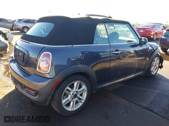 2012 MINI Convertible S with VIN WMWZP3C53CT550336, listed as a IAAI auction lot 40857283 with 51,111 mi miles and . Bid and sale history available at DreamBid. Image 4.