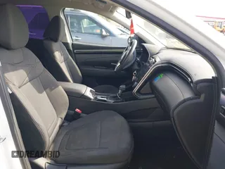 2022 Hyundai Tucson SE z VIN 5NMJACAE3NH012650, wystawiony jako IAAI lot #42137835 z przebiegiem 107 599 mil mil oraz . Historia ofert i sprzedaży dostępna na DreamBid. Obrazek 5.