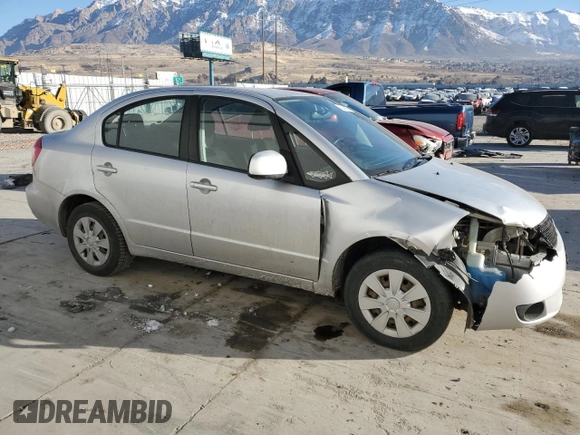2010 Suzuki SX4 LE with VIN JS2YC5A27A6300498, listed as a Copart auction lot 43036655 with 237,647 mi miles and Salvage Title. Bid and sale history available at carsss.com. Image 4.