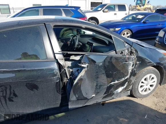 2020 Toyota Prius L Eco with VIN JTDKARFU1L3114502, listed as a IAAI auction lot 41134750 with 62,222 mi miles and . Bid and sale history available at DreamBid. Image 6.