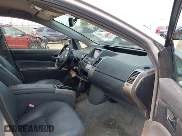2007 Toyota Prius z VIN JTDKB20U677694177, wystawiony jako IAAI lot #42408658 z przebiegiem 261 175 mil mil oraz . Historia ofert i sprzedaży dostępna na DreamBid. Obrazek 5.