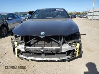 2019 BMW 5 Series M550i xDrive with VIN WBAJB9C50KB464503, listed as a Copart auction lot 56995825 with 67,324 mi miles and Salvage title. Bid and sale history available at DreamBid. Image 5.