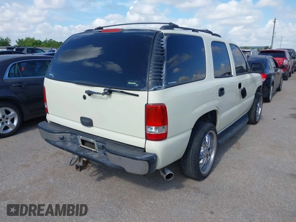 2004 Chevrolet Tahoe LS with VIN 1GNEC13V14J106457, listed as a IAAI auction lot 42576037 with 169,886 mi miles and . Bid and sale history available at DreamBid. Image 4.