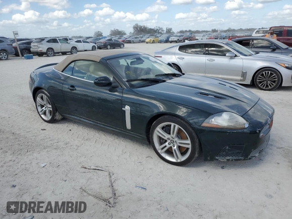 2007 Jaguar XK with VIN SAJWA44C779B12243, listed as a Copart auction lot 77239534 with Not Provided miles and Salvage Title. Bid and sale history available at carsss.com. Image 4.