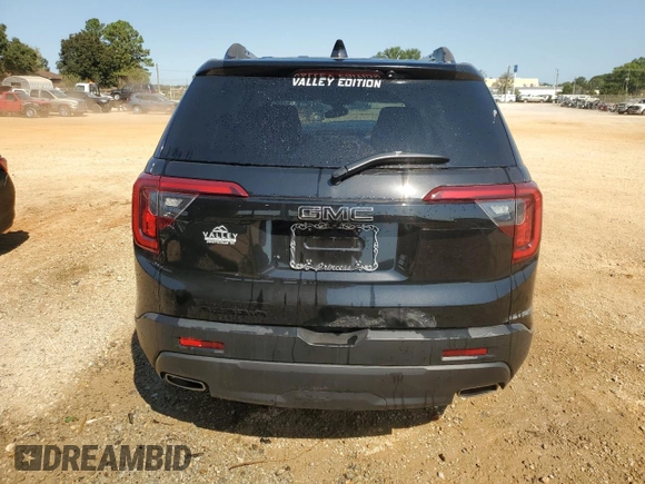 2023 GMC Acadia SLT with VIN 1GKKNMLS7PZ253048, listed as a Copart auction lot 74921474 with 10,084 mi miles and Salvage Title. Bid and sale history available at DreamBid. Image 6.