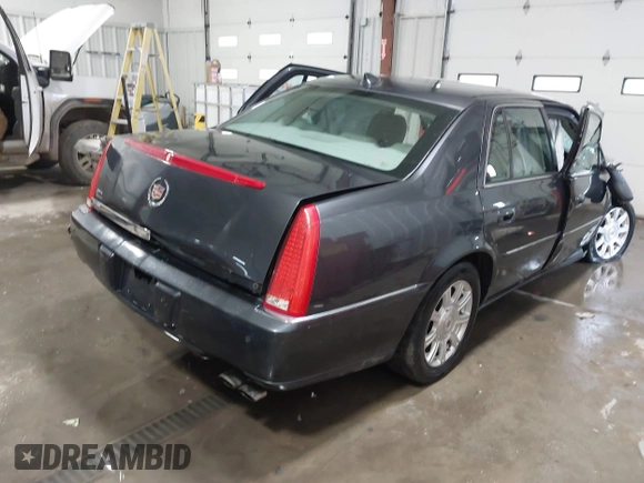 2009 Cadillac DTS w/1SA with VIN 1G6KD57Y69U109335, listed as a IAAI auction lot 41537145 with 1 mi miles. Bid and sale history available at carsss.com. Image 4.