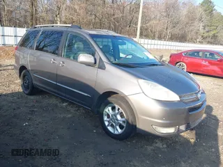 2005 Toyota Sienna XLE with VIN 5TDBA22CX5S053950, listed as a IAAI auction lot 41507796 with 163,019 mi miles. Bid and sale history available at carsss.com. Image 1.