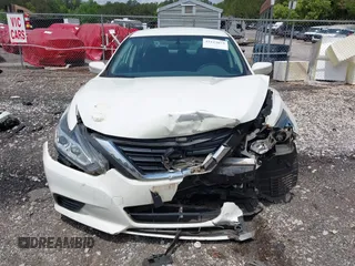 2017 Nissan Altima SV with VIN 1N4AL3APXHC233988, listed as a IAAI auction lot 42123873 with 49,000 mi miles and . Bid and sale history available at DreamBid. Image 13.