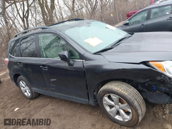 2014 Subaru Forester 2.5i Touring with VIN JF2SJAPC2EH552590, listed as a IAAI auction lot 41490583 with 84,538 mi miles. Bid and sale history available at carsss.com. Image 14.