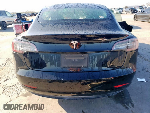 2021 Tesla Model 3 Standard Range Plus with VIN 5YJ3E1EA2MF977007, listed as a Copart auction lot 48516075 with Not Provided miles and Salvage Title. Bid and sale history available at DreamBid. Image 6.