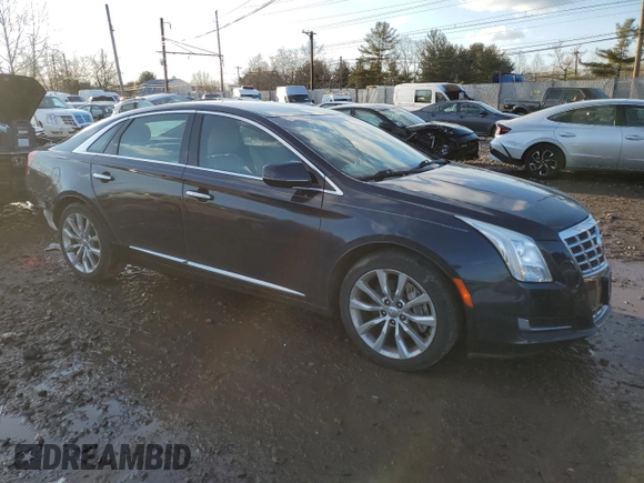 2014 Cadillac XTS with VIN 2G61L5S32E9192523, listed as a Copart auction lot 43868225 with 71,740 mi miles and Salvage Title. Bid and sale history available at carsss.com. Image 4.