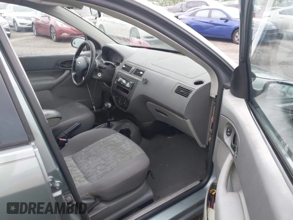 2005 Ford Focus SE with VIN 1FAHP36N65W304897, listed as a IAAI auction lot 40495173 with Not Provided miles and . Bid and sale history available at carsss.com. Image 5.