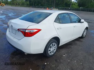 2016 Toyota Corolla L z VIN 2T1BURHE0GC641909, wystawiony jako IAAI lot #42583396 z przebiegiem 124 790 mil mil oraz . Historia ofert i sprzedaży dostępna na DreamBid. Obrazek 4.