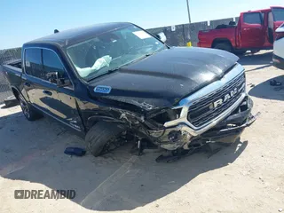 2024 Ram 1500 Limited with VIN 1C6SRFHT0RN115947, listed as a IAAI auction lot 42235255 with 18,961 mi miles and . Bid and sale history available at DreamBid. Image 1.