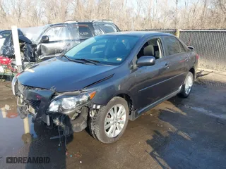 2010 Toyota Corolla with VIN 1NXBU4EE7AZ316204, listed as a IAAI auction lot 41767026 with 121,323 mi miles. Bid and sale history available at carsss.com. Image 18.