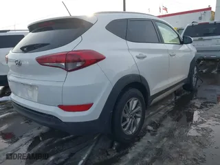 2017 Hyundai Tucson SE Plus with VIN KM8J33A44HU352769, listed as a IAAI auction lot 41106280 with 117,809 mi miles. Bid and sale history available at carsss.com. Image 4.