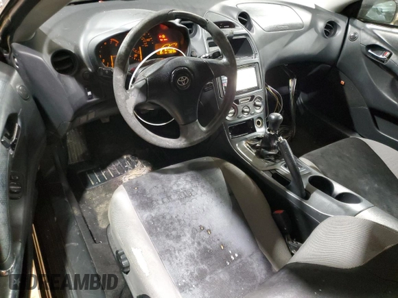 2003 Toyota Celica GT z VIN JTDDR32T130160537, wystawiony jako Copart lot #43136865 z przebiegiem 138 796 mil mil oraz Czysty tytuł • Clean title. Historia ofert i sprzedaży dostępna na DreamBid. Obrazek 8.