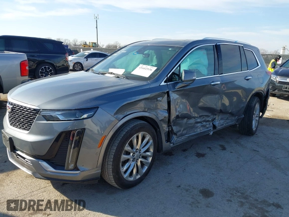 2020 Cadillac XT6 FWD Premium Luxury z VIN 1GYKPCRS8LZ129799, wystawiony jako IAAI lot #41602536 z przebiegiem 96 865 mil mil oraz . Historia ofert i sprzedaży dostępna na DreamBid. Obrazek 17.