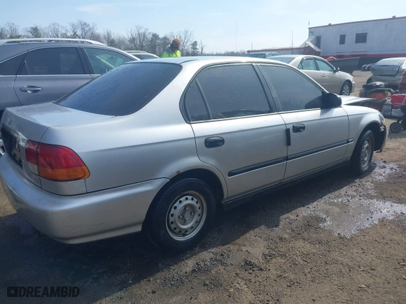 1996 Honda Civic DX with VIN 2HGEJ6627TH550103, listed as a IAAI auction lot 41710877 with 142,608 mi miles. Bid and sale history available at carsss.com. Image 4.