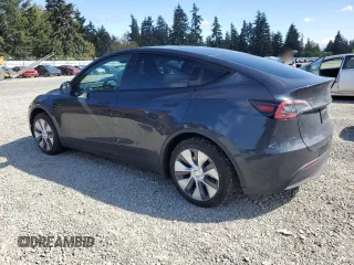 2024 Tesla Model Y Long Range with VIN 7SAYGAEE8RF987571, listed as a Copart auction lot 55110485 with 19,732 mi miles and Salvage title. Bid and sale history available at DreamBid. Image 2.
