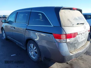 2014 Honda Odyssey EX-L with VIN 5FNRL5H61EB079739, listed as a IAAI auction lot 41659048 with 137,012 mi miles and . Bid and sale history available at carsss.com. Image 3.