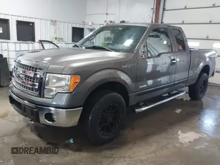 2014 Ford F-150 XL with VIN 1FTFX1ET0EFC70803, listed as a IAAI auction lot 41639807 with 118,745 mi miles and . Bid and sale history available at DreamBid. Image 2.
