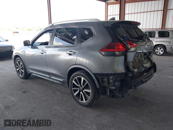 2018 Nissan Rogue SV with VIN JN8AT2MT9JW485804, listed as a IAAI auction lot 41711723 with 74,860 mi miles and . Bid and sale history available at carsss.com. Image 3.
