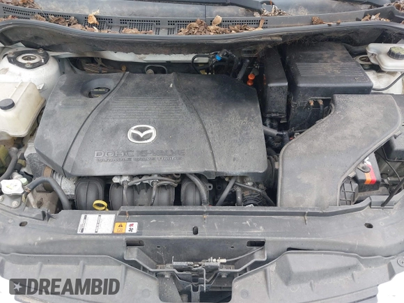 2007 Mazda 5 Touring with VIN JM1CR293570140860, listed as a IAAI auction lot 41908624 with 185,738 mi miles and . Bid and sale history available at DreamBid. Image 10.