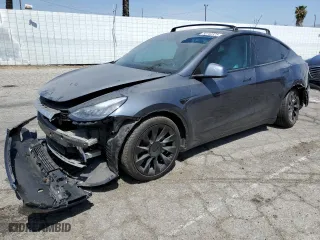 2021 Tesla Model Y Long Range with VIN 5YJYGDEEXMF070154, listed as a Copart auction lot 50742325 with 23,376 mi miles and Salvage Title. Bid and sale history available at carsss.com. Image 1.
