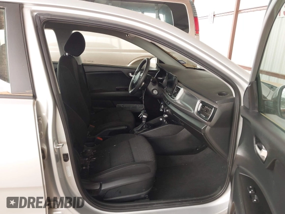 2023 Kia Rio LX z VIN 3KPA24AD8PE599304, wystawiony jako IAAI lot #41936054 z przebiegiem 16 261 mil mil oraz . Historia ofert i sprzedaży dostępna na DreamBid. Obrazek 5.