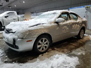 2008 Kia Optima LX z VIN KNAGE124785253088, wystawiony jako Copart lot #83643634 z przebiegiem 189 972 mil mil oraz Szkoda całkowita • Salvage title. Historia ofert i sprzedaży dostępna na DreamBid. Obrazek 1.