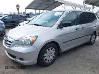 2005 Honda Odyssey LX with VIN 5FNRL38245B096035, listed as a IAAI auction lot 41998823 with 209,177 mi miles. Bid and sale history available at carsss.com. Image 2.