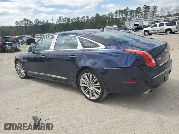 2015 Jaguar XJ Portfolio with VIN SAJWJ2GD8F8V84252, listed as a Copart auction lot 49313935 with 90,545 mi miles and Salvage title. Bid and sale history available at DreamBid. Image 2.