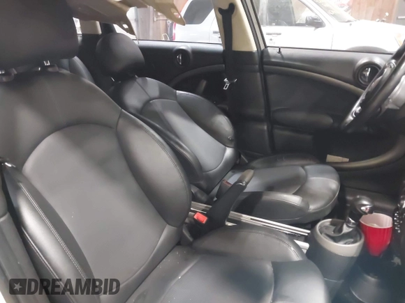 2012 MINI Countryman S with VIN WMWZC5C58CWL60067, listed as a IAAI auction lot 42081725 with 104,397 mi miles and . Bid and sale history available at DreamBid. Image 8.