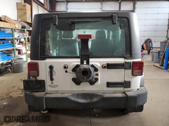2011 Jeep Wrangler Sport with VIN 1J4AA2D12BL555530, listed as a Copart auction lot 42049915 with 83,349 mi miles and Salvage Title. Bid and sale history available at carsss.com. Image 6.