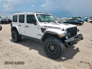 2021 Jeep Wrangler Unlimited Rubicon with VIN 1C4JJXFG1MW849460, listed as a Copart auction lot 62701895 with 54,517 mi miles and Salvage title. Bid and sale history available at DreamBid. Image 4.