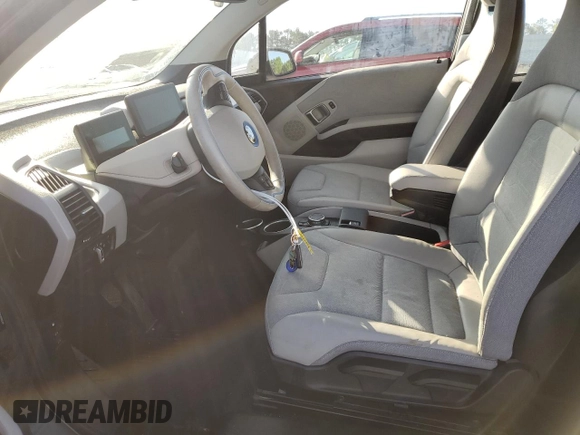 2015 BMW i3 with VIN WBY1Z4C53FV501645, listed as a Copart auction lot 52301145 with 61,740 mi miles and Salvage title. Bid and sale history available at DreamBid. Image 7.