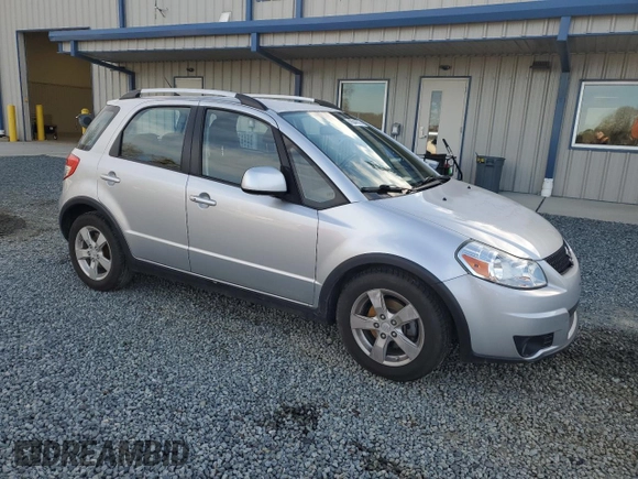 2010 Suzuki SX4 Touring with VIN JS2YB5A73A6300609, listed as a Copart auction lot 45541075 with 140,641 mi miles and Salvage Title. Bid and sale history available at carsss.com. Image 4.