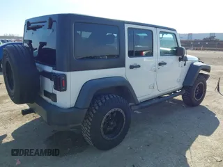 2014 Jeep Wrangler Unlimited Sport with VIN 1C4BJWDG2EL100591, listed as a IAAI auction lot 41578357 with 155,929 mi miles and . Bid and sale history available at DreamBid. Image 4.