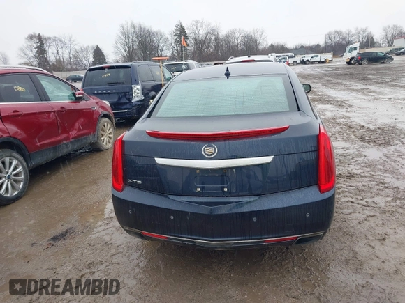 2013 Cadillac XTS Luxury with VIN 2G61P5S3XD9196239, listed as a IAAI auction lot 41205081 with 161,885 mi miles and . Bid and sale history available at carsss.com. Image 16.
