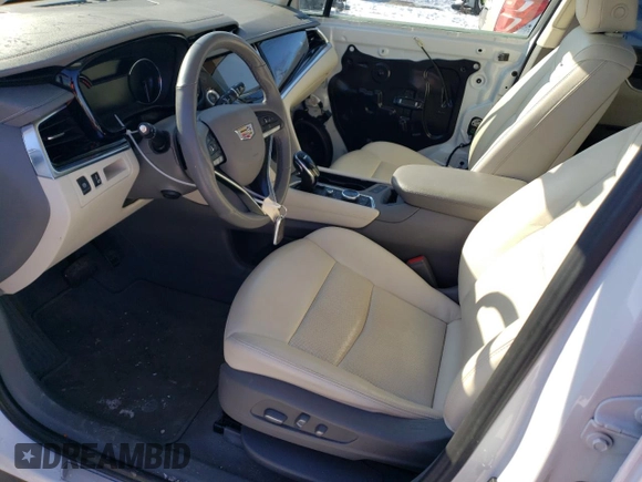 2022 Cadillac XT6 Premium Luxury with VIN 1GYKPCRS0NZ173802, listed as a Copart auction lot 87419534 with 28,373 mi miles and Salvage Title. Bid and sale history available at carsss.com. Image 7.