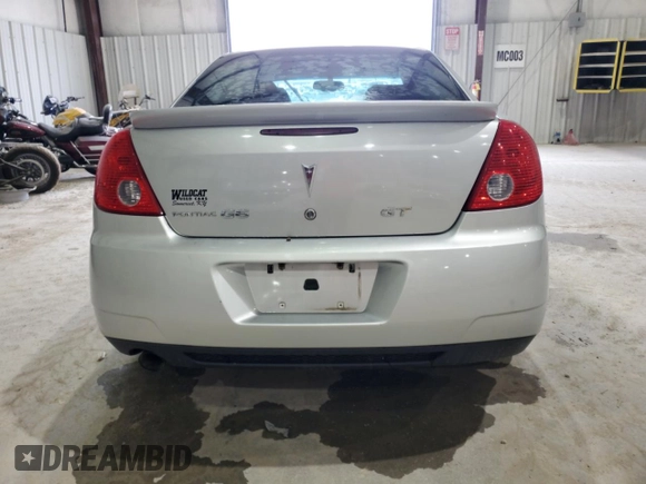 2009 Pontiac G6 GT 1SB with VIN 1G2ZK57KX94253844, listed as a Copart auction lot 60093625 with 95,690 mi miles and Salvage title. Bid and sale history available at DreamBid. Image 6.