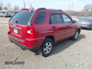 2009 Kia Sportage LX with VIN KNDJF724197558391, listed as a IAAI auction lot 41696362 with 170,555 mi miles. Bid and sale history available at carsss.com. Image 4.