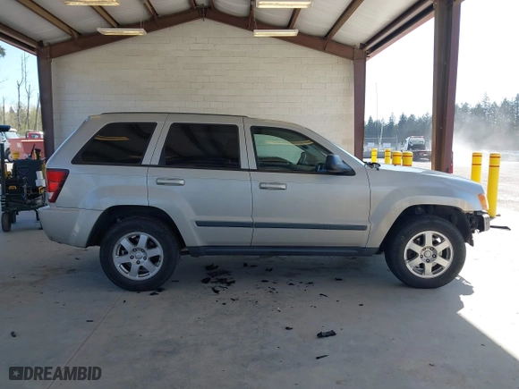 2008 Jeep Grand Cherokee Laredo with VIN 1J8GR48K18C222454, listed as a IAAI auction lot 42047541 with 180,145 mi miles. Bid and sale history available at carsss.com. Image 14.